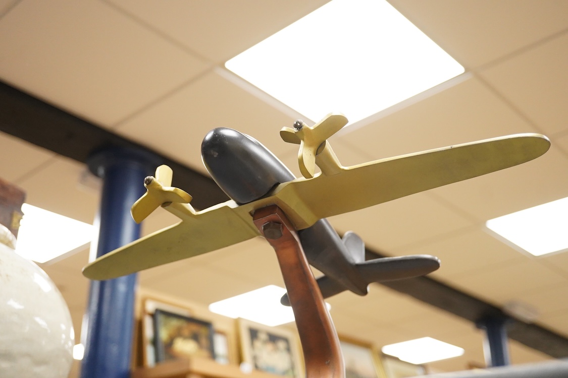 An Art Deco style mixed metal model of a WW2 plane- 24.5cm long x 24cm high